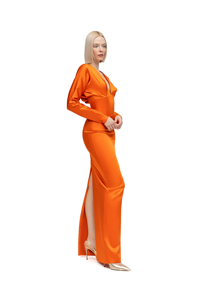 Orange MOON HAKAN YILDIRIM Esther maxi dress with flowing fabric and sleeveless design, displayed on a hanger against a neutral background.