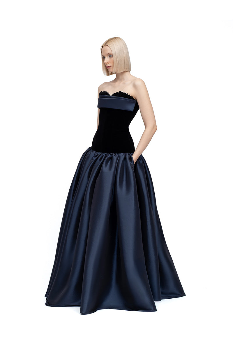 Black and navy Marina maxi dress by MOON / HAKAN YILDIRIM, featuring flowy fabric and elegant design in a full-length view.