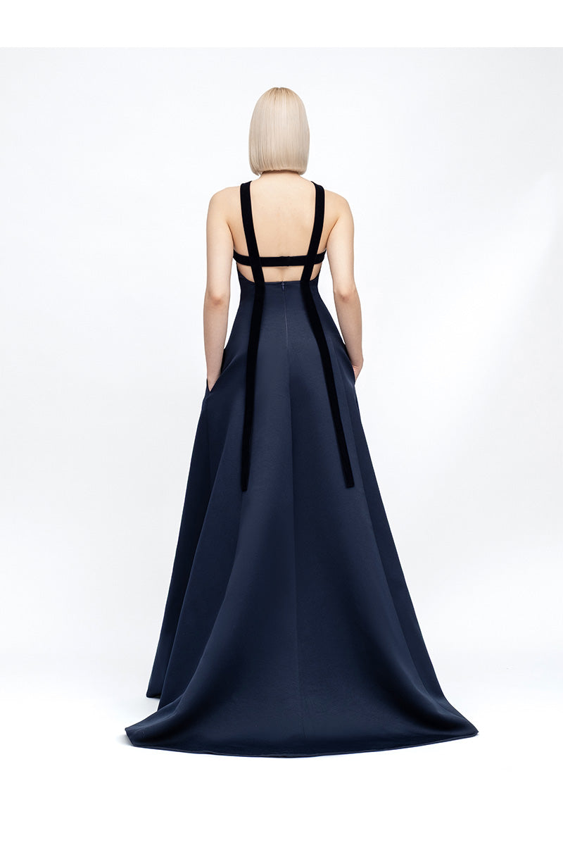 Navy maxi dress by MOON / HAKAN YILDIRIM featuring a flowing silhouette and elegant design, shown on a model.