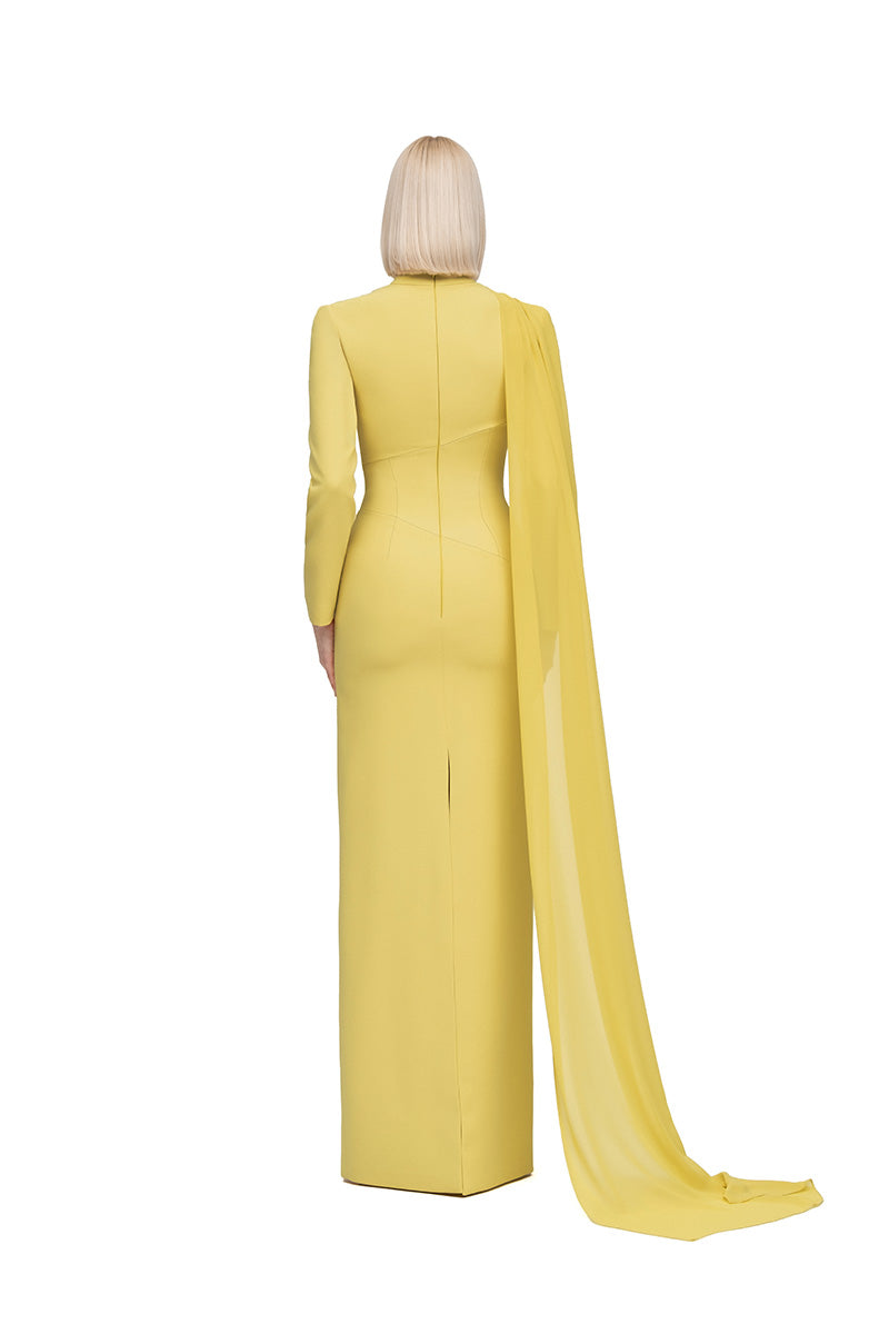Moon Hakaan Yildirim Maria Lemon Maxi Dress, flowing yellow fabric with a fitted waist and elegant design.