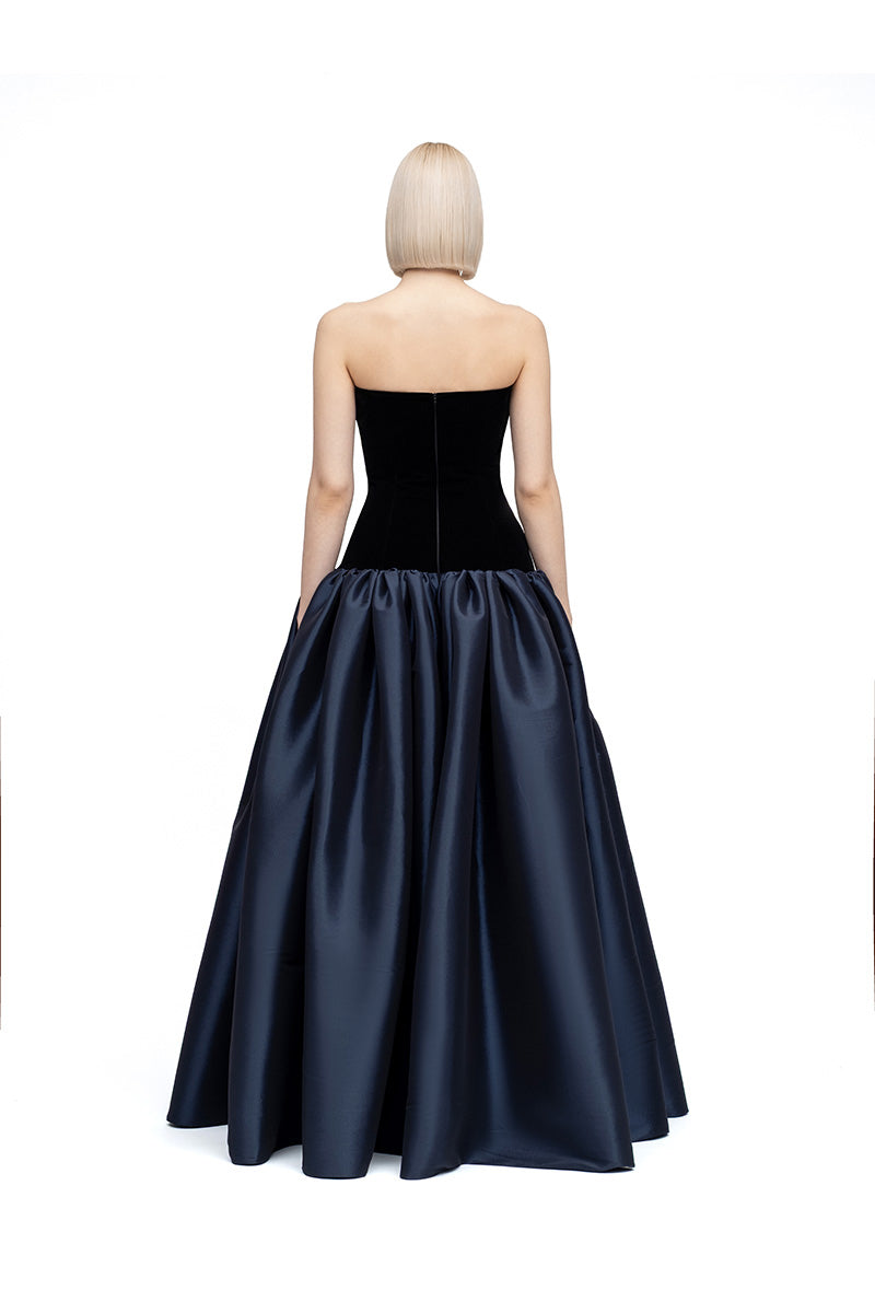 Black and navy Marina maxi dress by MOON / HAKAN YILDIRIM, featuring flowing fabric and elegant design perfect for stylish occasions.
