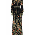 Raishma Maison maxi dress displayed on a model, featuring flowing fabric and elegant design perfect for formal occasions.