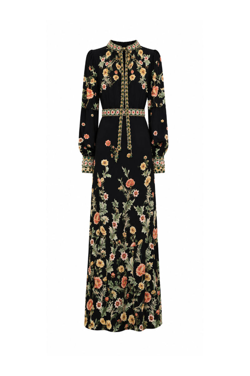 Raishma Maison maxi dress displayed on a model, featuring flowing fabric and elegant design perfect for formal occasions.