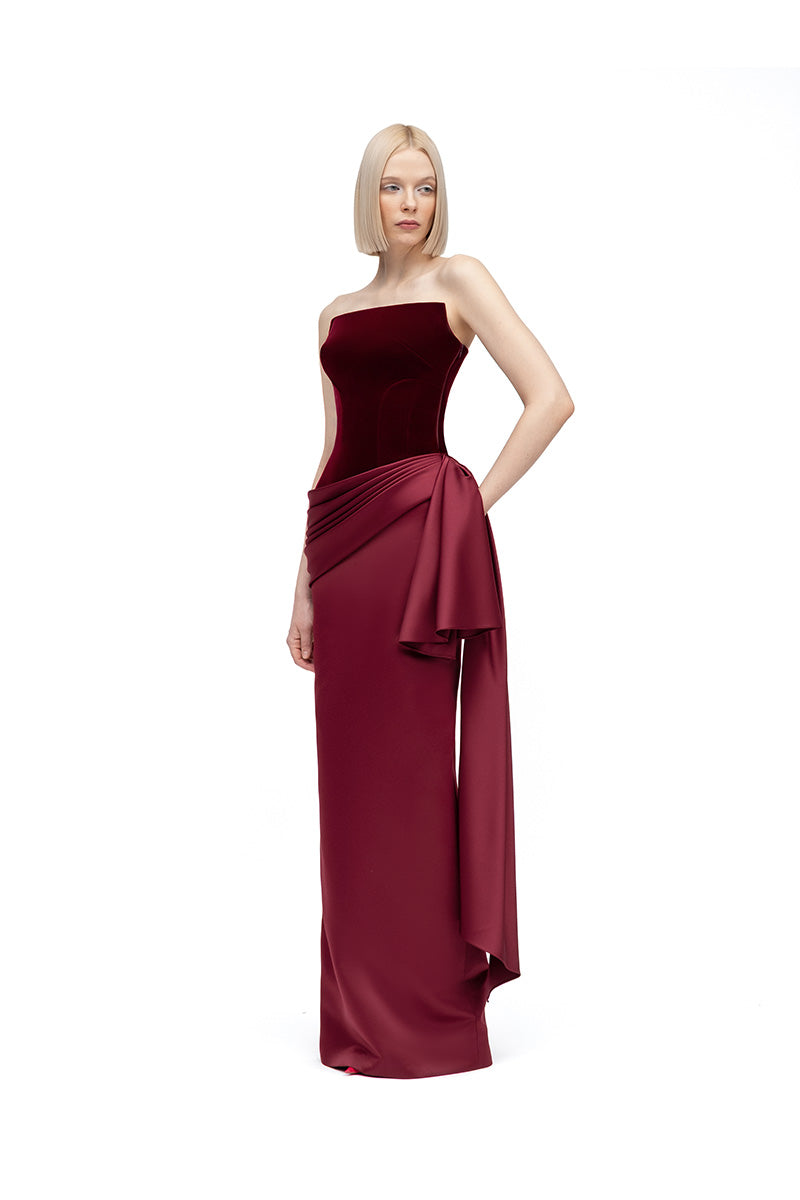 Deep burgundy and wine maxi dress by MOON / HAKAN YILDIRIM featuring flowing fabric and elegant design.
