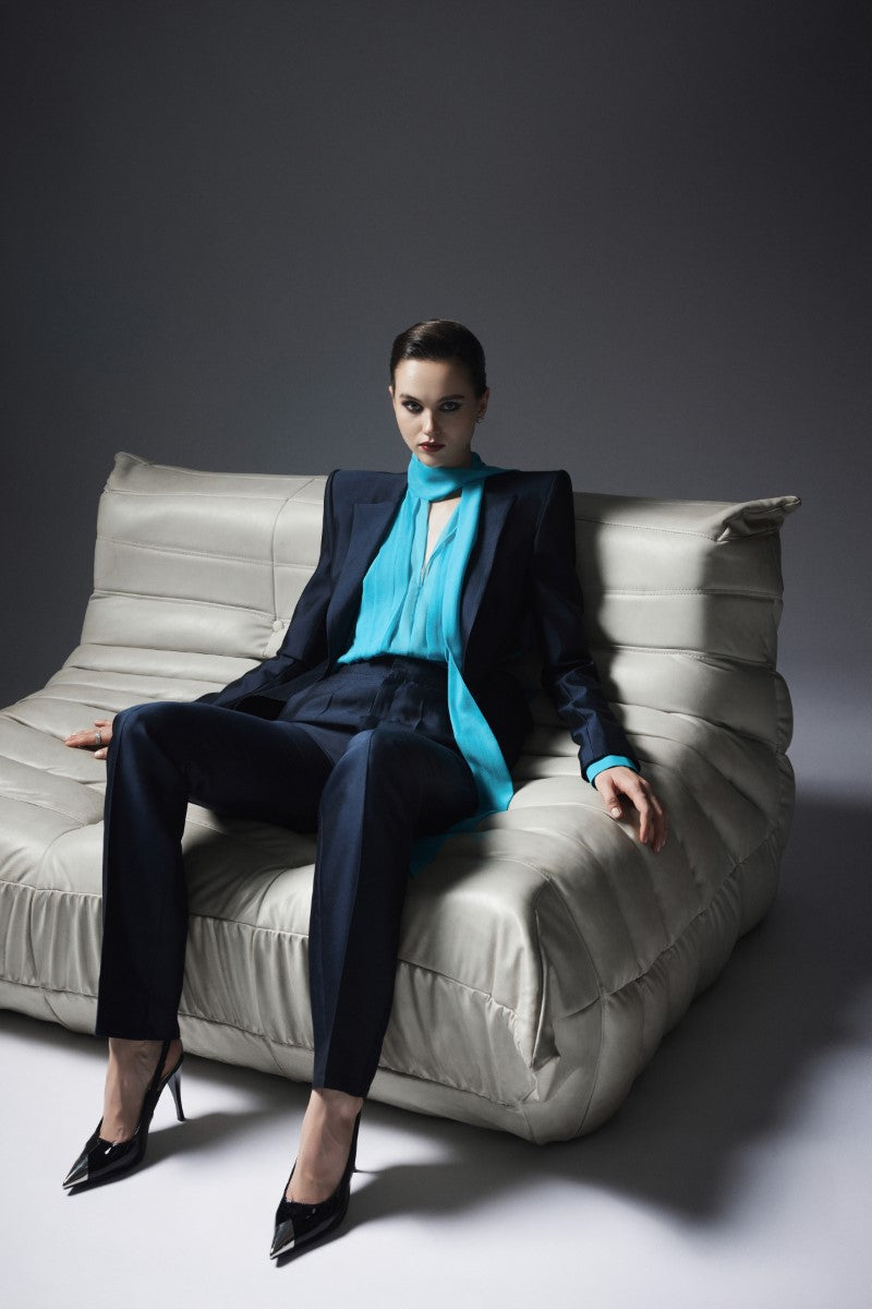 Navy LEKIEU NIKORA pants featuring a tailored fit and classic design, shown on a model.