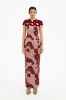 Elegant rose petal couture column gown by Happy Clothing featuring flowing fabric and a fitted silhouette.
