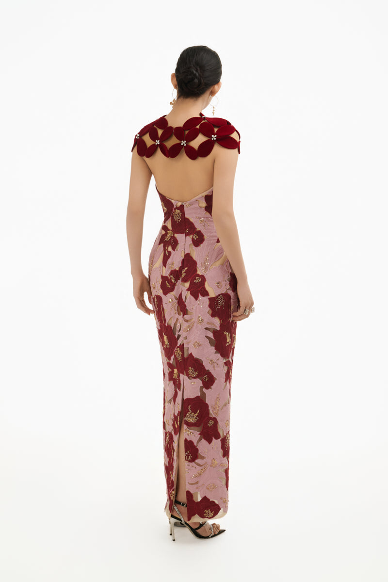Elegant rose petal couture column gown by Happy Clothing featuring flowing fabric and intricate detailing.