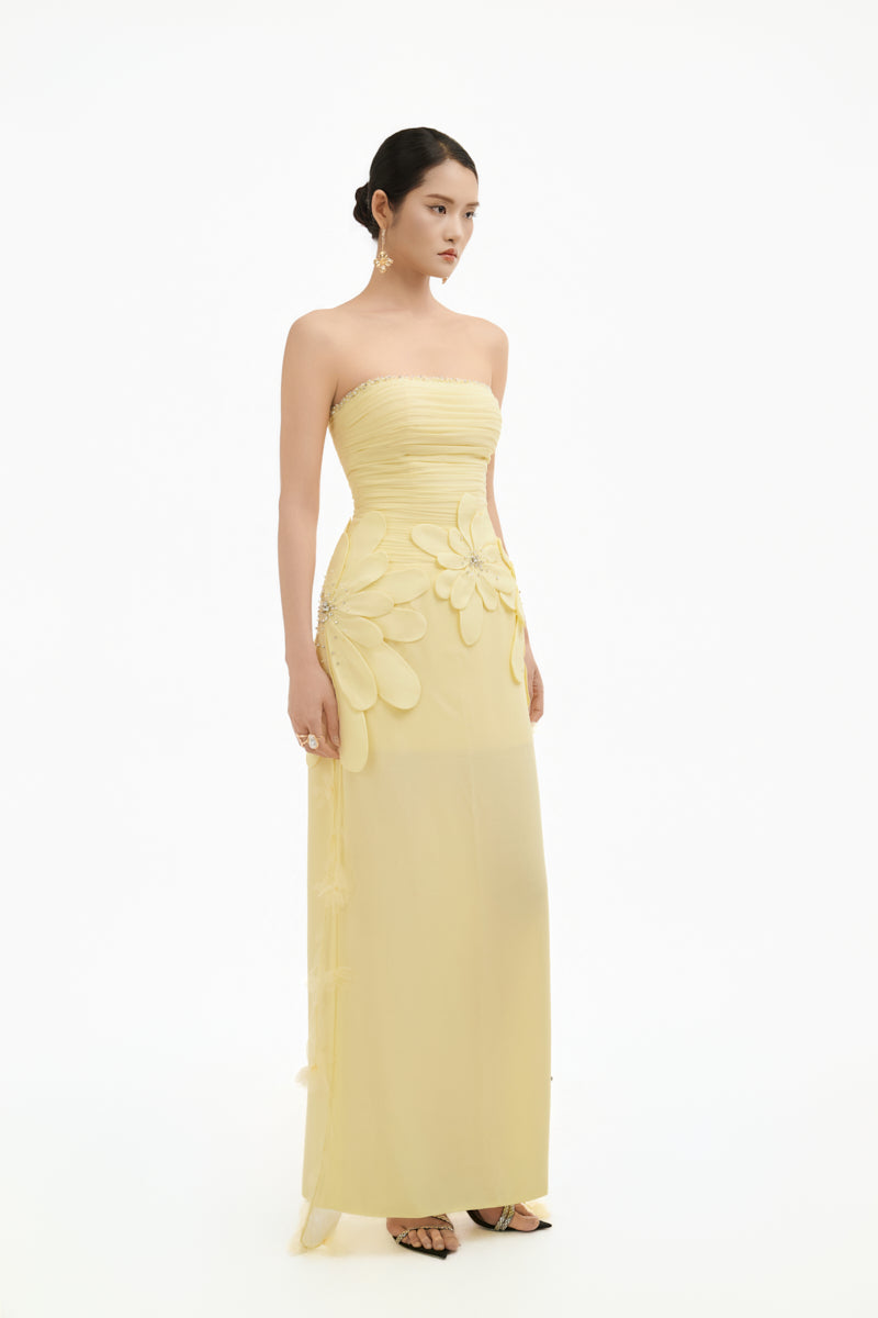 Yellow 3D petal maxi gown by Happy Clothing, featuring a flowing design with intricate petal details, perfect for elegant occasions.