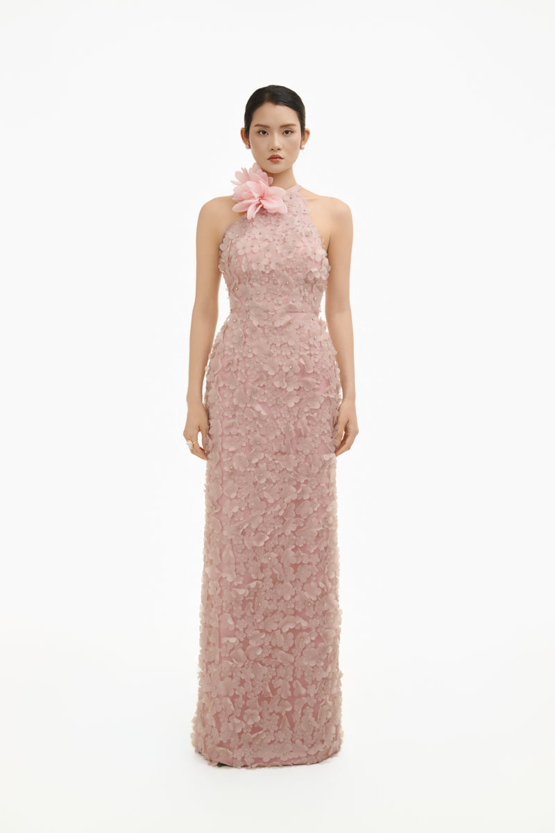 Elegant blush floral Whisper halter maxi gown by Happy Clothing featuring a flowing skirt and floral pattern.