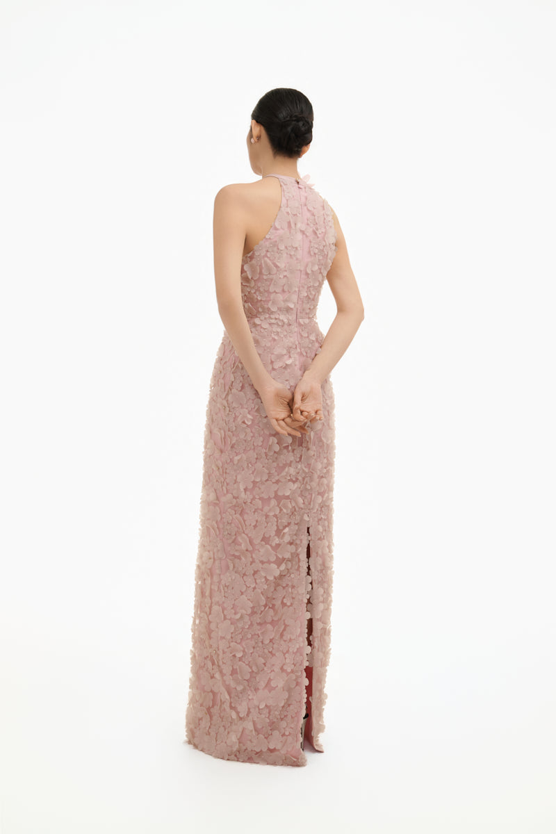 Floral blush halter maxi gown by Happy Clothing featuring a flowing design and elegant floral pattern.