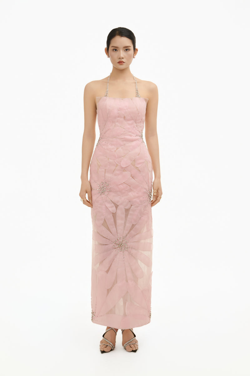 Soft pink crystal floral gown by Happy Clothing with delicate floral details and flowing fabric, perfect for special occasions.