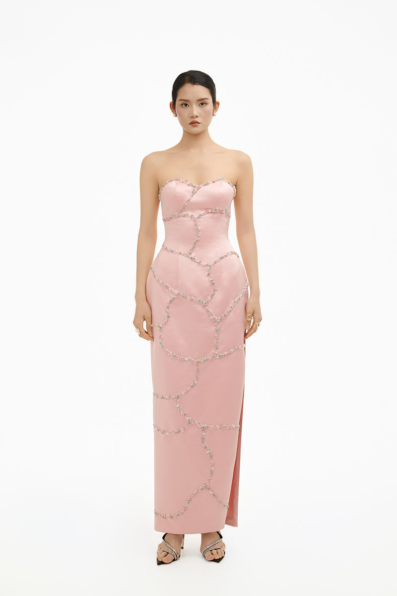 Elegant blush crystal wave strapless gown by Happy Clothing featuring a flowing design and intricate crystal detailing.