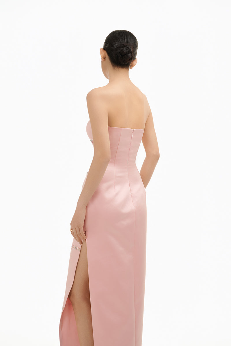 Elegant blush crystal wave strapless gown by Happy Clothing featuring a flowing design and crystal embellishments.