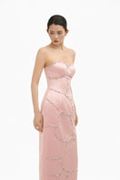 Elegant blush crystal wave strapless gown by Happy Clothing, featuring a flowing design and intricate crystal details.