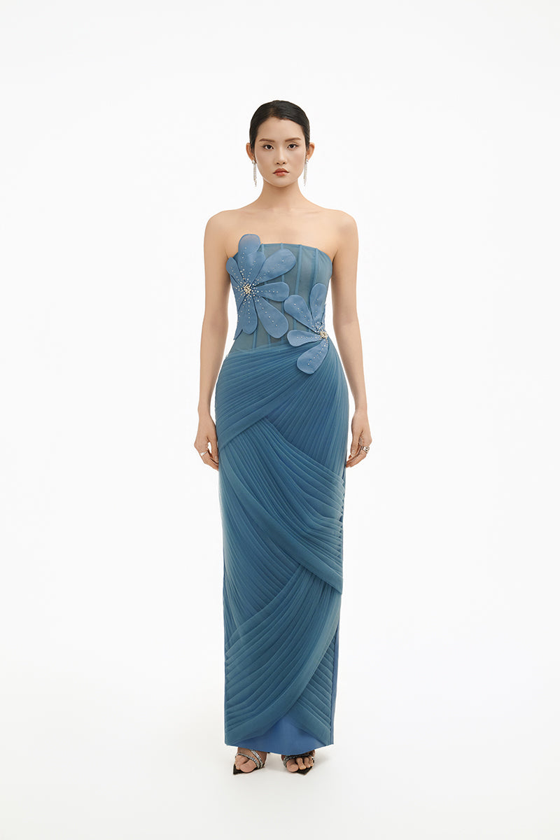 Blue 3D floral draped maxi gown by Happy Clothing featuring flowing fabric and elegant design, perfect for formal occasions.