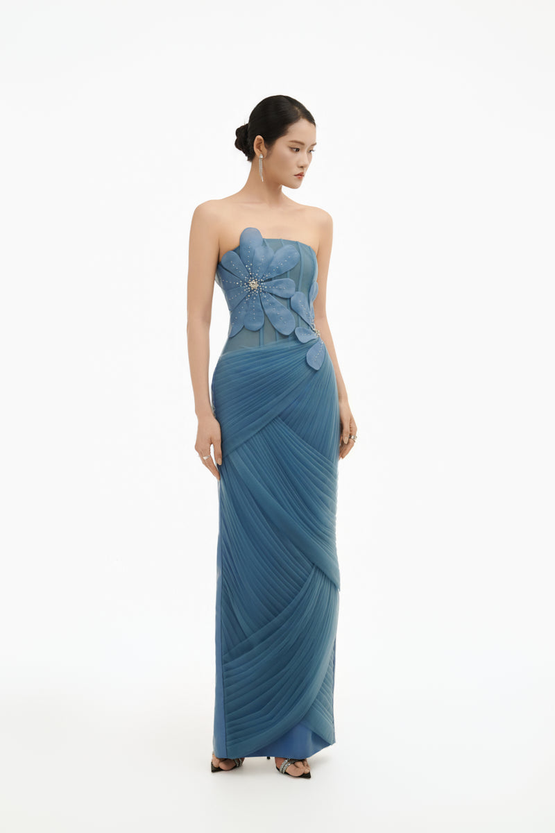 Blue 3D floral draped maxi gown by Happy Clothing, flowing fabric with intricate floral details and elegant design.