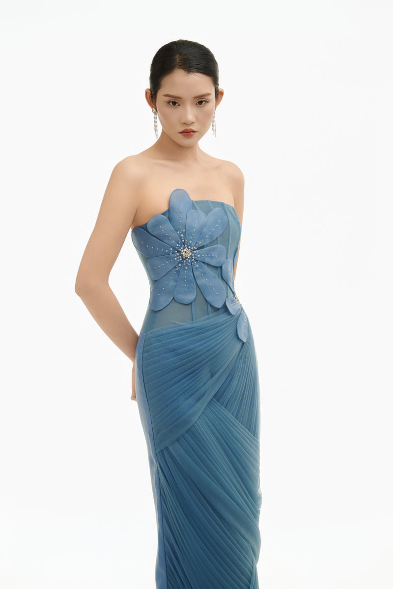 Blue 3D floral draped maxi gown by Happy Clothing, featuring flowing fabric and elegant floral details.