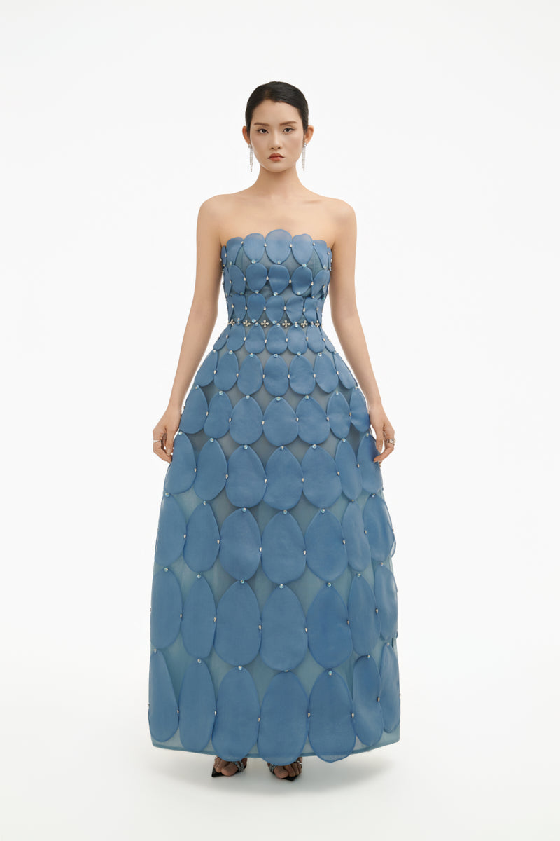 Blue 3D petal sculpture maxi gown by Happy Clothing, flowing fabric with intricate petal details for elegant evening wear.