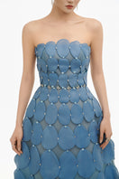 Blue 3D petal sculpted maxi gown from Happy Clothing, featuring intricate floral details and flowing fabric design.