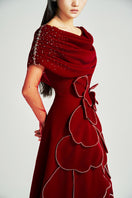 Red off-shoulder velvet gown by HAPPY CLOTHING from CULT MIA X HAPPY CLOTHING, featuring a flowing design and luxurious fabric.