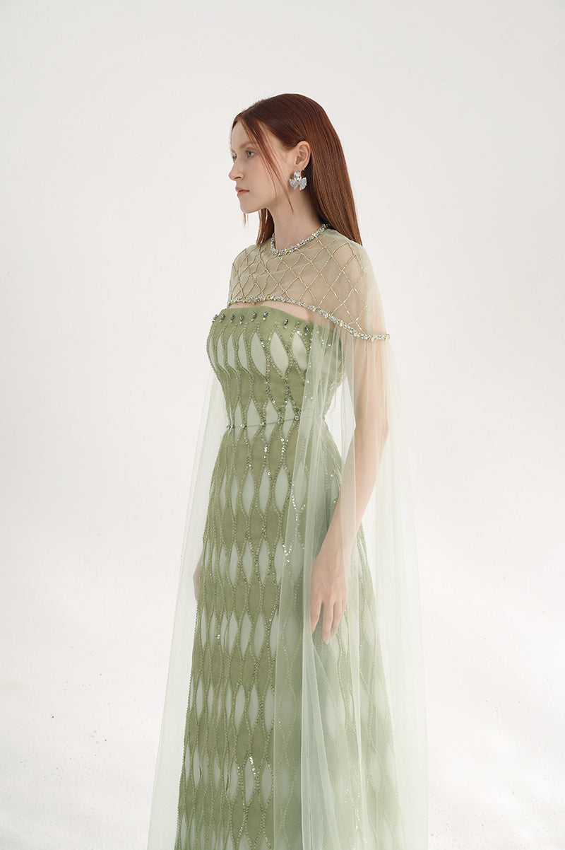 Elegant dusty mesh gown with embellishments and matching cape by Happy Clothing, showcased on a mannequin.