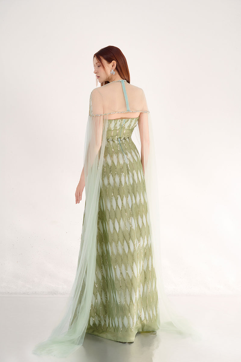Elegant dusty mesh gown with embellishments and a matching cape by Happy Clothing, featuring intricate details and flowing fabric.