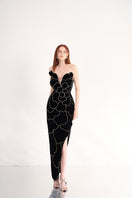 Black velvet strapless gown with V-neck and petal design by Happy Clothing, showcasing elegant fabric and sophisticated style.