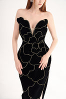 Black velvet V-neck petal strapless gown by Happy Clothing, flowing and elegant, displayed on a mannequin.