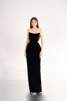 Black velvet maxi dress with stone embellishments, featuring a fitted bodice and flowing skirt from Happy Clothing.
