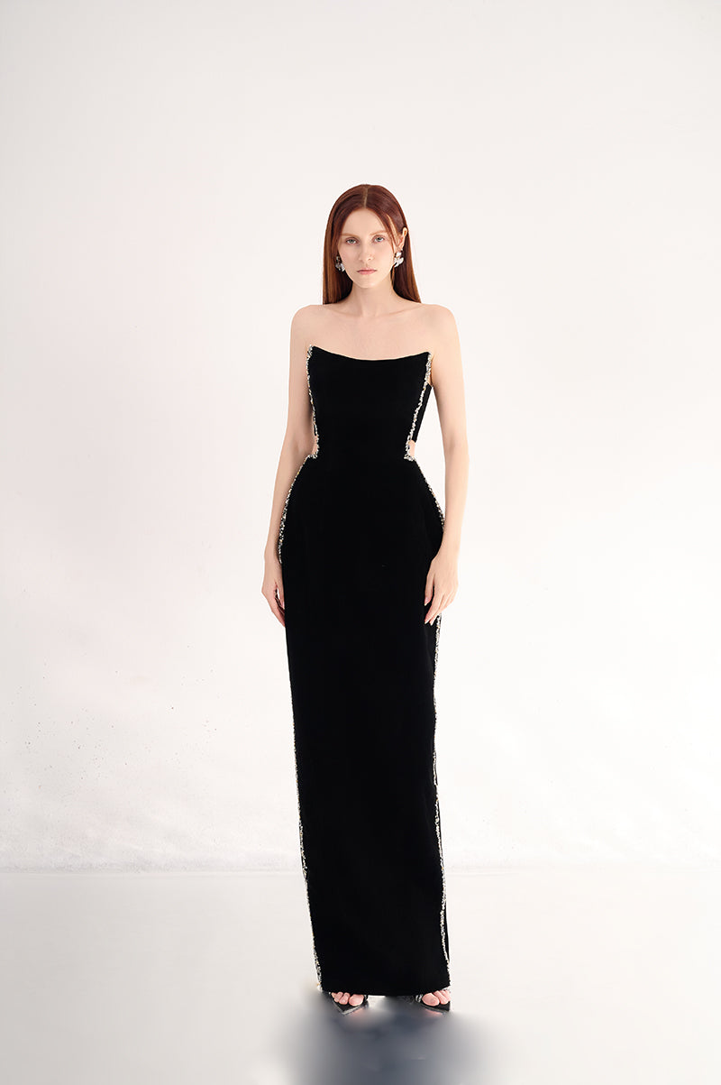 Black velvet maxi dress with stone embellishments, featuring a fitted bodice and flowing skirt from Happy Clothing.