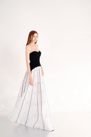 Black and white strapless gown from Happy Clothing, elegant evening dress with a fitted bodice and flowing skirt.