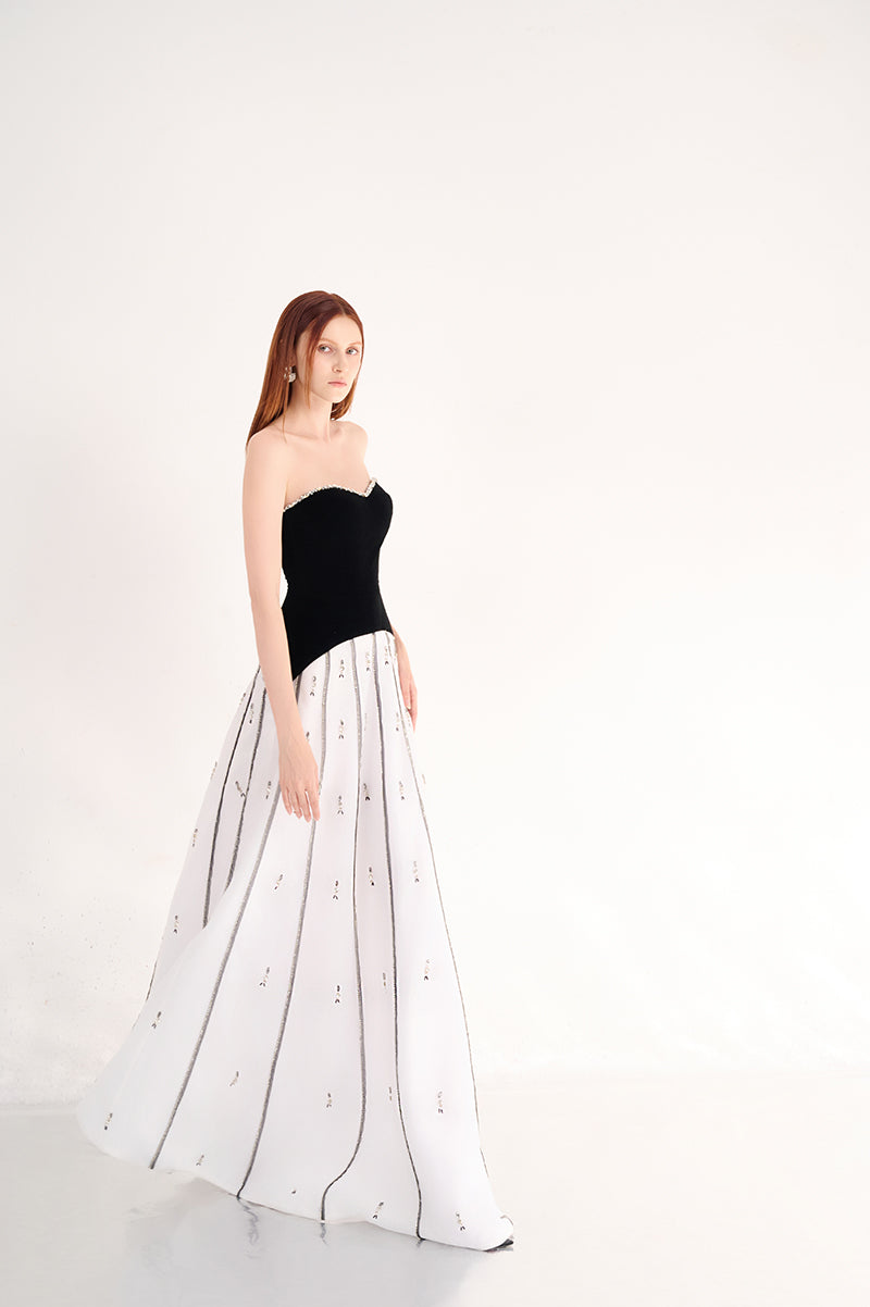Black and white strapless gown from Happy Clothing, elegant evening dress with a fitted bodice and flowing skirt.