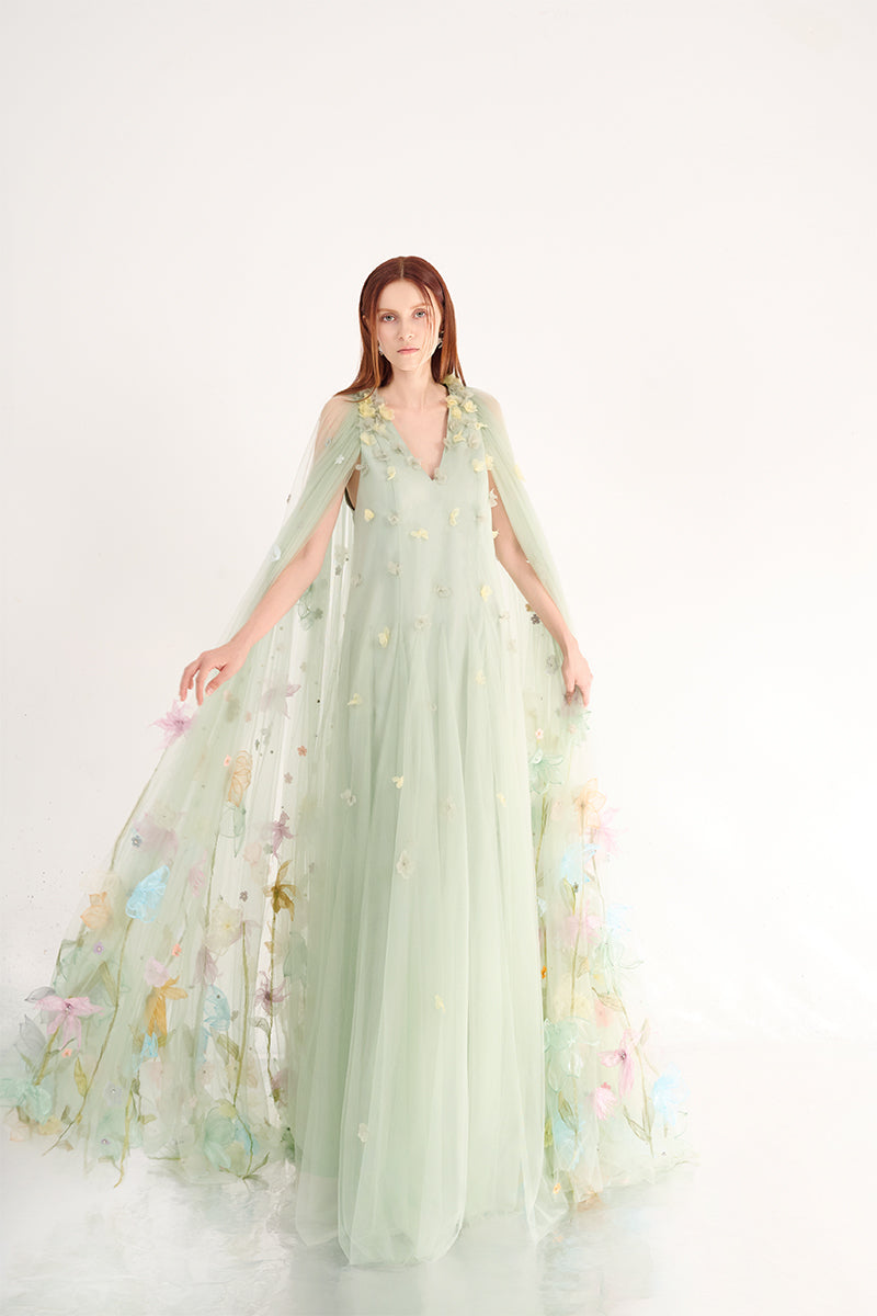 Light mint gown with floral details from Happy Clothing, featuring a flowing fabric and elegant design.