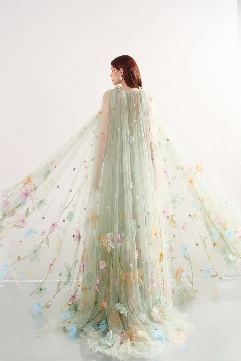 Light mint gown with floral details from Happy Clothing, showcasing elegant fabric and intricate floral embroidery.