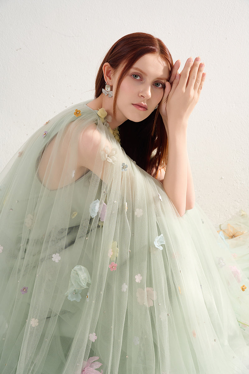 Light mint gown with floral details from Happy Clothing, flowing fabric and elegant design perfect for special occasions.
