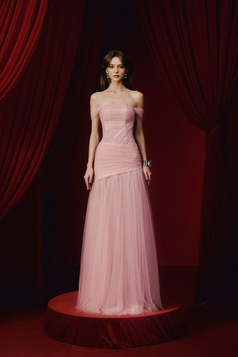 Pink AYLA gown by JOSÉPHINE, shown in a flowing, elegant dress with a fitted bodice and soft fabric.