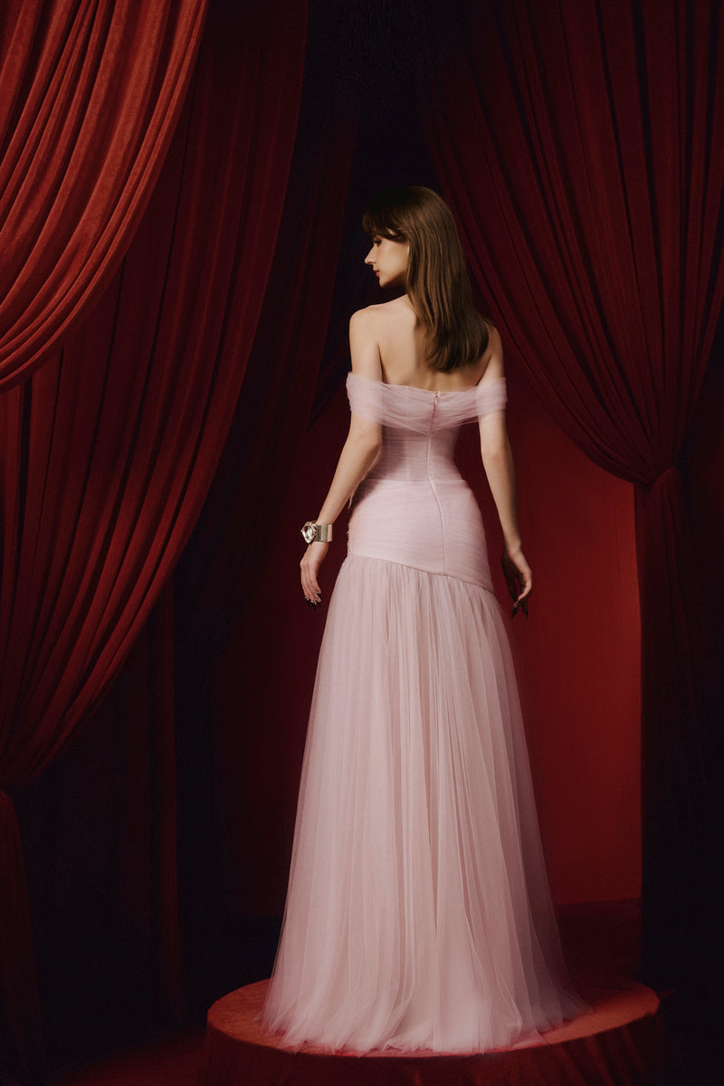 Pink AYLA gown by JOSÉPHINE with elegant flowing fabric and intricate detailing, perfect for formal occasions.