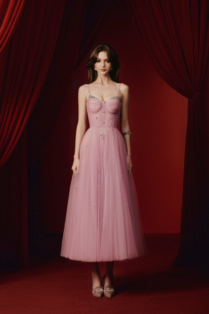 Purple Evelyn gown by Joséphine, elegant floor-length dress with flowing fabric and intricate details, suitable for formal occasions.