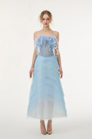 Light blue tulle and organza gown by 21Six, featuring a flowing silhouette and elegant design, perfect for special occasions.