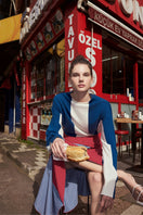 Labeca Keyra red and blue cotton striped midi skirt with a fitted waist and flowing hem, perfect for casual or dressy looks.