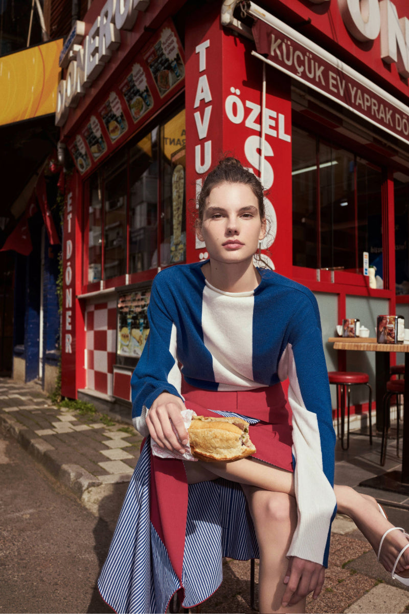 Labeca Keyra red and blue cotton striped midi skirt with a fitted waist and flowing hem, perfect for casual or dressy looks.
