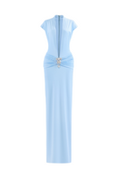 Blue deep plunge gown by CEM featuring a maxi dress design with a brooch detail and elegant flowing fabric.