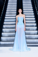Blue silk strapless corset gown by CEM, featuring a fitted bodice and flowing skirt, elegant evening wear for formal occasions.
