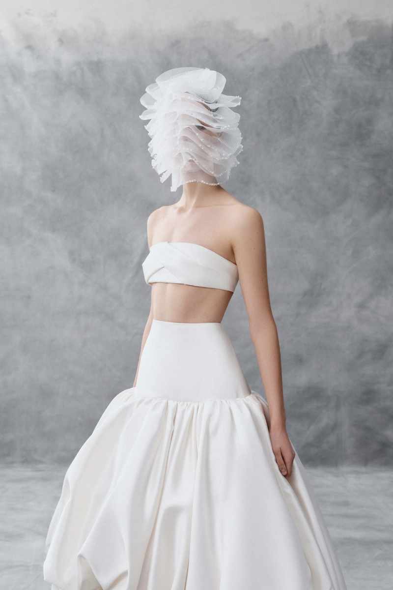 White draped bandeau top and balloon skirt co-ord set by Phan Huy, featuring flowing fabric and stylish design.