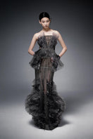 Dark gray pleated chiffon gown with crystal embroidery by Phan Huy, showcasing elegant pleats and intricate embellishments.