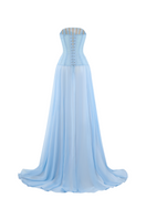 Blue silk strapless corset gown by CEM, featuring a fitted bodice and flowing skirt, elegant evening wear for formal occasions.