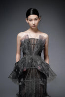 Dark gray pleated chiffon gown with crystal embroidery by Phan Huy, featuring elegant pleats and intricate embellishments.