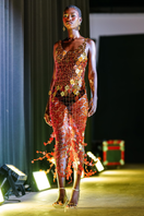 Onalaja sequined emblem midi skirt featuring a shimmering sequin design and sleek midi length for elegant style.