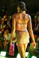 Onalaja Iris multi-crop top featuring a colorful, patterned design with short sleeves and a fitted silhouette.