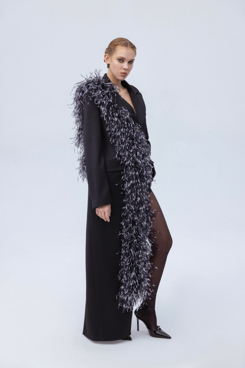Santa Brands feather jacket in jade color, lightweight and cozy, featuring a stylish design perfect for cold weather.